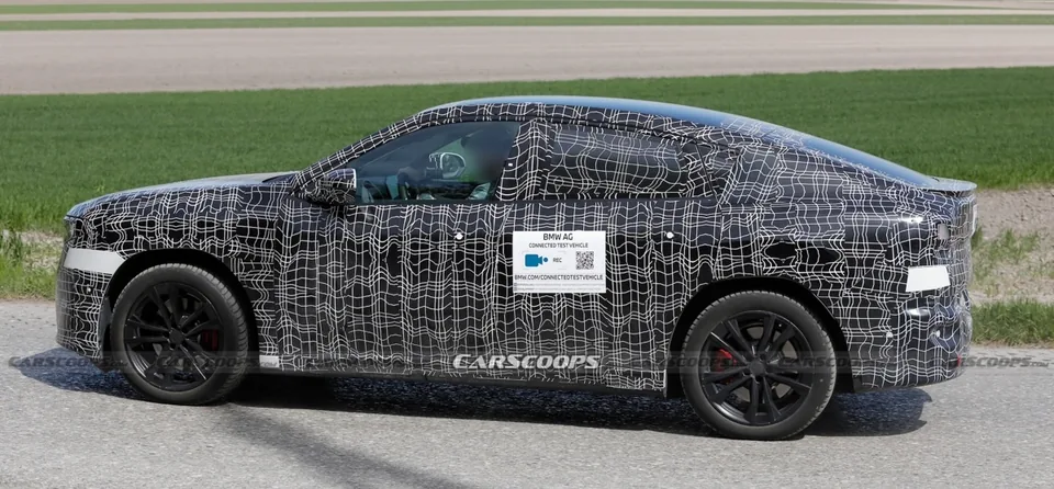BMW's Sleek New iX4 Electric Coupe Could Beat Its Sibling - image 2